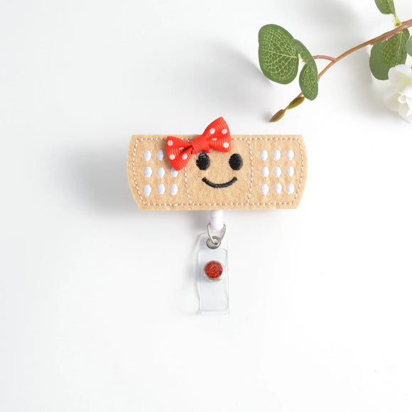 Fuzzy Buddy Badge Reel- Bandaid