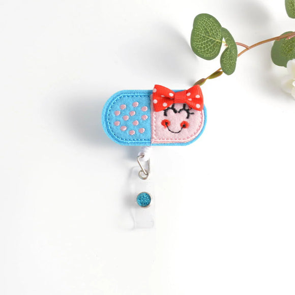 Fuzzy Buddy Badge Reel- Pill